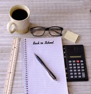Back To School written on white notepad Stock Photos