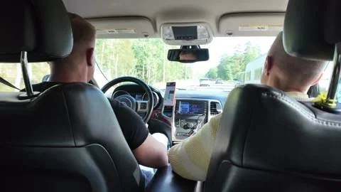 Back-seat Car View with Driver, Passenger, and Road Ahead Vidéo 347683326