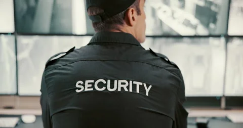 Back, security guard and man in control room, video surveillance and computer Stock Footage 303938431