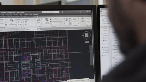 Back shot of an architect designer working on autocad sketch Stock Footage 99992119