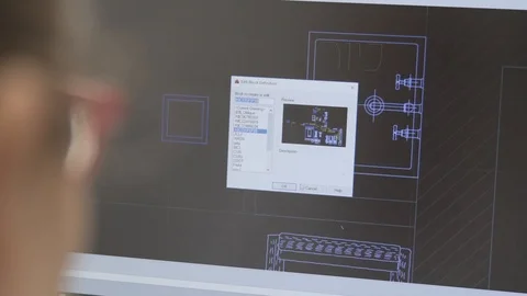 Back shot of an architect designer working on autocad sketch Stock Footage 99996908