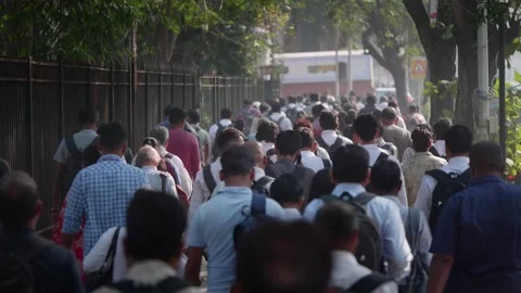 Back shot of crowd of people walking to workplace during morning rush hour Stock Footage 327132921