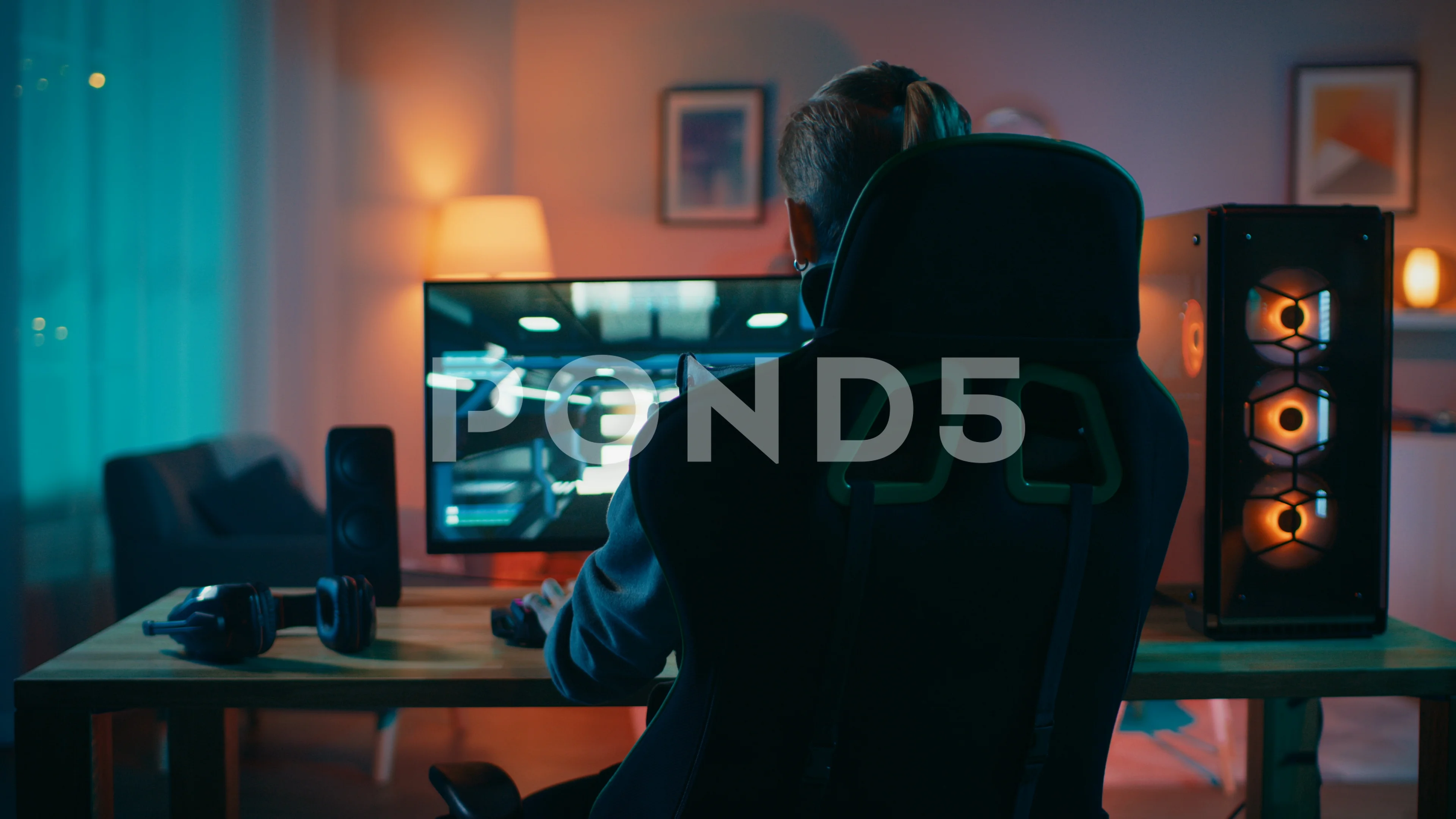 Back Shot of a Gamer Playing First-Perso... | Stock Video | Pond5