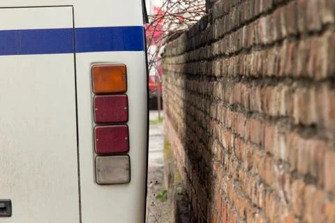 Back shot of head light of minibus Stock Photos