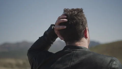 Back shot of a man in the leather jacket Stock Footage 264111689