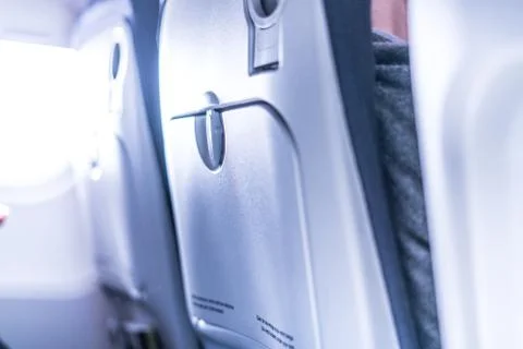 Back side of an airplane seat Stock Photos