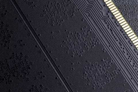 Back side of black ram modules abstract black surface background Stock Photos