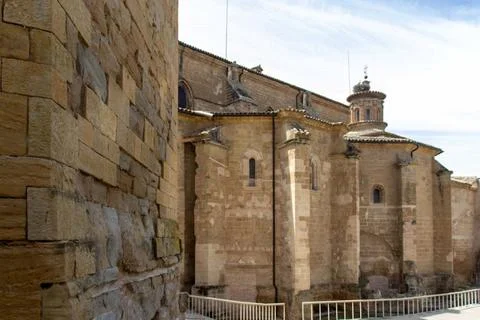 The back side of the cathedral of Barbastro,with storks on the roof Stock Photos
