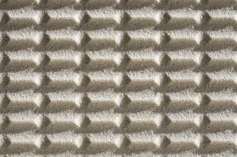 The back side of the ceramic finishing tile. Background Stock Photos