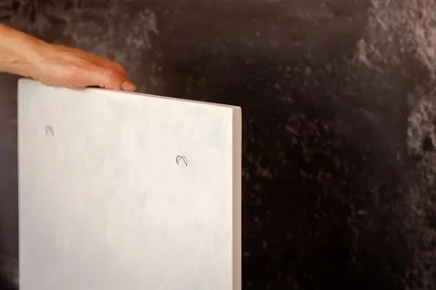 Back side of clay botanical bas-relief with hooks for hanging on wall for sty Stock Photos