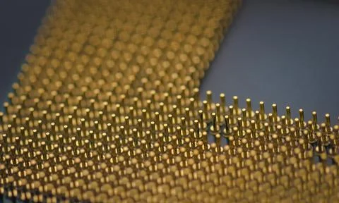 Back side of a computer processor, showing the golden pin layout. Extreme mac Stock Photos