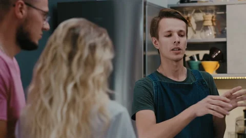 Back side of customer  couple ordering cappuccino drink to barista Stock Footage 132554103