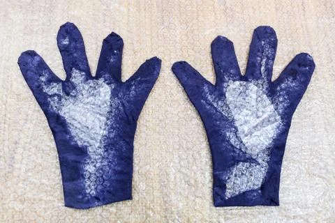 Back side of formed glove with cutting pattern 스톡 사진