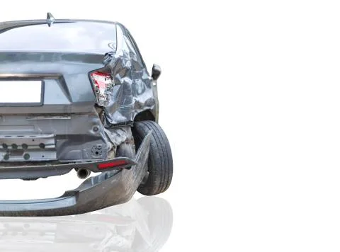 Back side of  gray color car damaged and broken by accident on road parking c Stock Photos