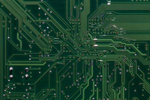 Back side of green digital circuit board - flat full-frame background and Stock Photos