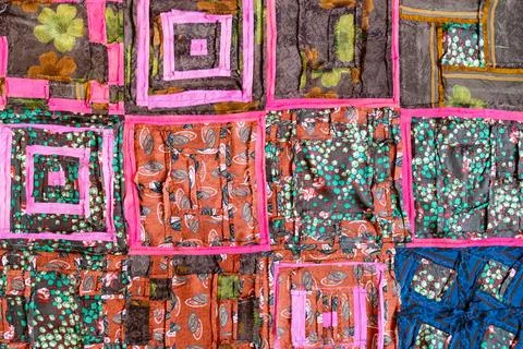 Back side of handcrafted patchwork cloth close up Stock Photos