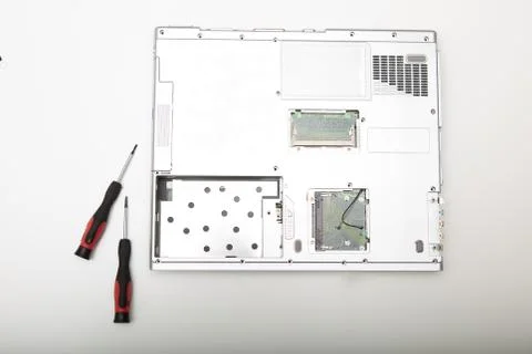 Back side of a modern laptop computer without battery Stock Photos