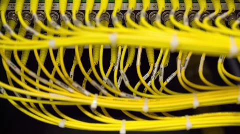 Back Side Of Modern Working Data Servers With Yellow Cable - Tilt Up Vídeo Stock 57117354