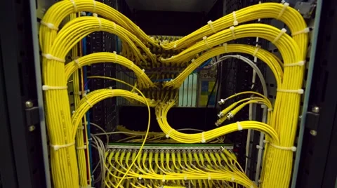 Back Side Of Modern Working Data Center Servers With Yellow Cable - Tilt Down 스톡 동영상 57724986