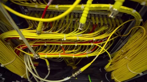 Back Side Of Modern Working Data Center Servers With Yellow Cable - Tilt Up 스톡 동영상 57726581
