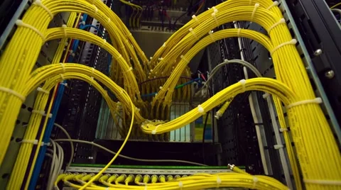 Back Side Of Modern Working Data Center Servers With Yellow Cable - Tilt Down Vidéo 57726755