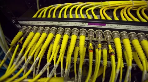 Back Side Of Modern Working Data Center Servers With Yellow Cable - Pan Right Vídeo Stock 57728416