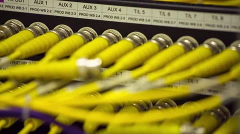 Back Side Of Modern Working Data Center Servers With Yellow Cable - Pan Left Vidéo 57729249