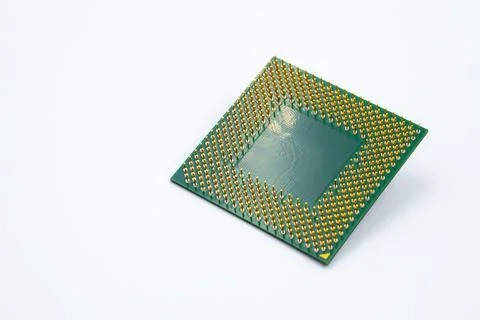 Back side of personal computer CPU processor chip isolated on white backgroun Stock Photos