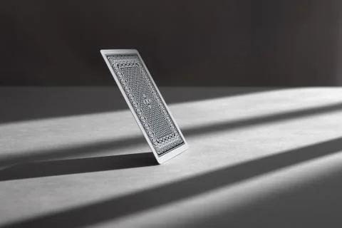 Back side of playing card. a dark background	 Stock Photos