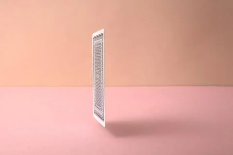 Back side of playing card on pink background.	 Stock Photos