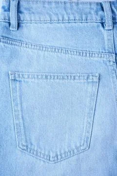 Back side pocket on blue jeans pants close up Stock Photos