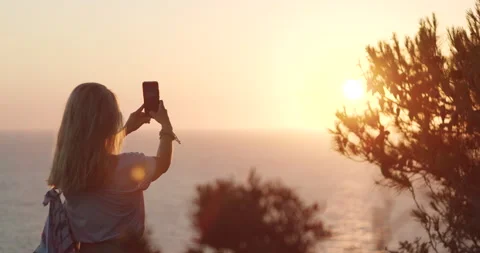 Back side portrait of elegant Long-haired woman walking natural light sunset Stock Footage 140782971