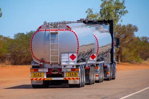 Back side of road train transporting gasoline in Australian Outback Stock Photos