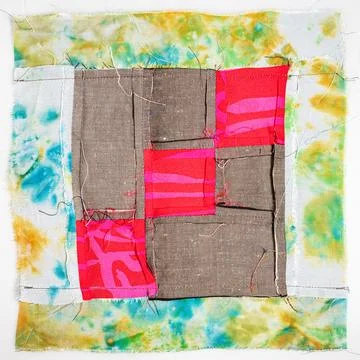 Back side of sewn fragment of patchwork cloth Stock Photos