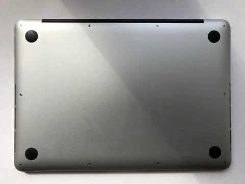 Back side of silver MacBook Pro 13 Fotos Stock