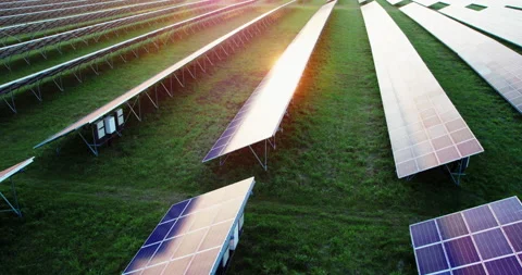 Back side of the solar panels of a modern power plant in the evening at sunset. Video stock 165493494