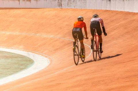 Back side two bicyclists 스톡 사진