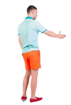 Back side view of man  in shorts handshake Foto stock
