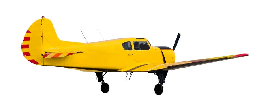 Back side view of yellow light aircraft with piston engine. Isolated on white Stock Photos