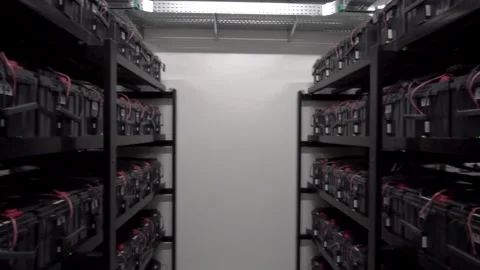 Back side of working data servers with flashing LED lights Video stock 169475487