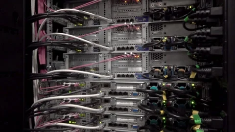 Back side of working data servers with flashing LED lights Video stock 169475600
