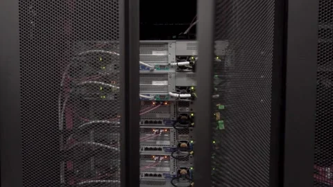 Back side of working data servers with flashing LED lights hd Video stock 169475800