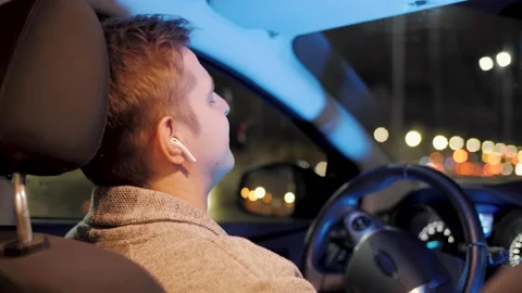 Back sit shot of an exhausted man, using cellphone meditation app after work Stock Footage 145305342