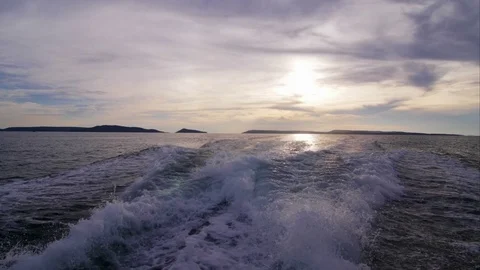 Back of speedboat on the sunset Stock Footage 76554507