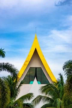 The back of the temple is a bright blue sky. Stock Photos