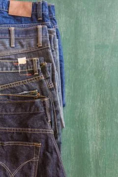 Back three jeans with chalkboard background Stock Photos