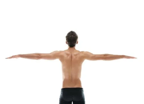 Back, topless and man in studio with open arms, physique and wellness for fitnes Stock Photos