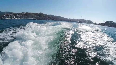 Back trail of a motorboat in slow motion Stock Footage 135021032