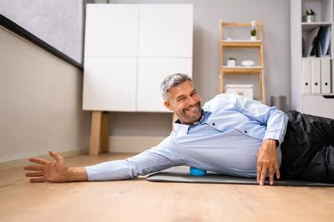 Back Trigger Point Massage Using Spiky Ball Stock Photos