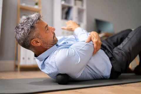 Back Trigger Point Massage Using Foam Ball Stock Photos